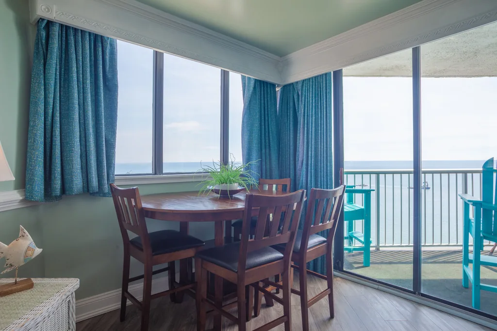 Dining table beside windows looking toward the Atlantic